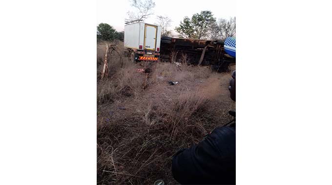SEVEN KILLED AS BUS CRASHES